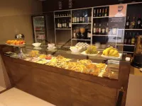 Altos de Merlo Suites - Bữa sáng