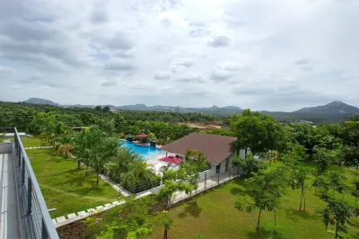 Trishvam Symphony Hotels near KRP Dam Park