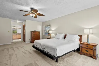 Riverside Retreat: 4BR/3BA with Private Dock and Boat Lift Hotels near Santa Lucia River Club