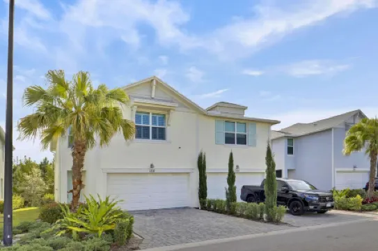 Down the road from the beach! Coastal home w/ full kitchen, 3BR, patio & grill.