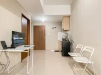 Cream Tone 1BR at Royal Sentul Park Apartment By Travelio
