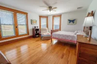 Family owned and operated spacious Farm House with a modern decorative flair.