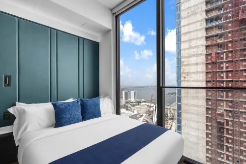 E11EVEN Studio · Bay Views + Rooftop Day Club Pool - مطابخ