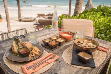 Delek Tulum Отели рядом с достопримечательностью «Ziggy Beach»