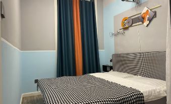 Yujian Theme Cinema Room Homestay (Shuiyuan Road No.1)