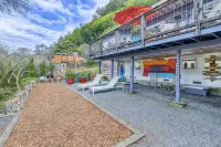 Riverfront cottage w/ hot tub, lush gardens, privacy & river access, pets ok!