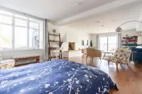 River front with large decks and dock over the Hudson