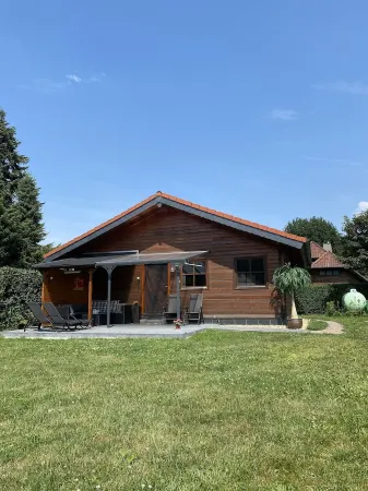 Wooden house on Meinweg with large garden Отели в г. Вассенберг