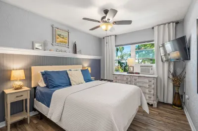 Tranquil Tide Villa 1 -River view w/ pool on riverwalk, near beach, pet friendly