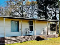 Quiet country living, mobile home down dirt lane