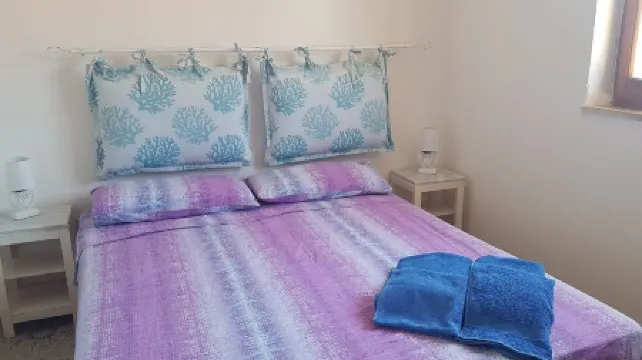 Attic with sea view just 30 meters from the beaches with parking space in the courtyard!