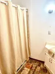 Cozy 4-Bedroom House in Man w WiFi, Arcade Game, and Extra Parking. Near Trails.