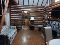 Beautiful full log cabin with  direct private frontage , beautiful sunsets .