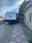 RV in foothills located near stores. Smoking area with fire pit provided.