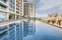 Elite LUX Holiday Homes - Dubai Creek Oasis: 2BR Luxe w/ Burj View