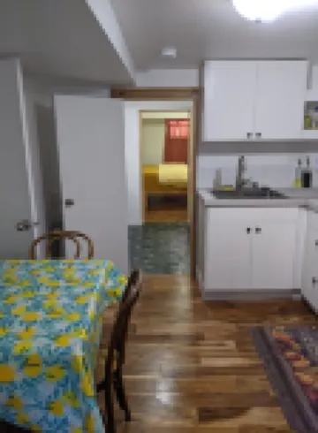 Lovely basement apartment with covered outdoor patio.