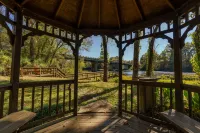 Cozy Fireplace and River Access with Gazebo - Charming Bright Oasis