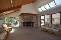 Expansive Oceanfront Patio and Resort-Style Amenities - Charming Coastal Haven