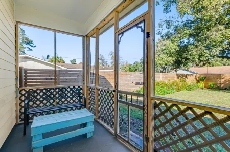 Dog-friendly oasis with central AC, patio & fenced yard - walkable location