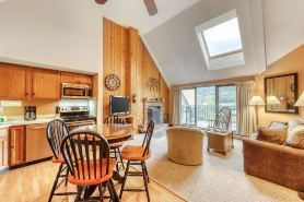 Top-floor condo with mountain views & covered parking space