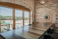 Private Patio and Rooftop Deck Views - Charming Waterfront Condo Hotels in Grand Haven