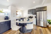 Breezy dog-friendly house with hot tub, central AC, game room, & washer/dryer