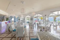 Aphrodite Beachfront Hotel by Konnect, Roda Hotels in Roda
