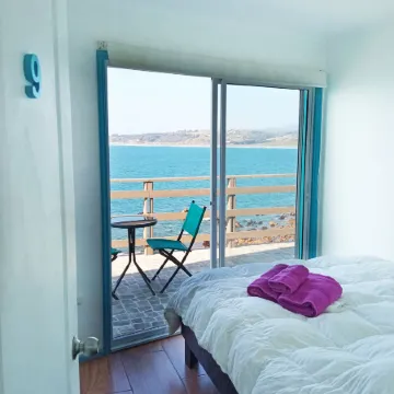 Bahía Luz Hostal Отели в г. Конкон