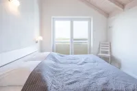 Exklusiv Eingerichtetes Ferienhaus in Strandnahe - balcony
