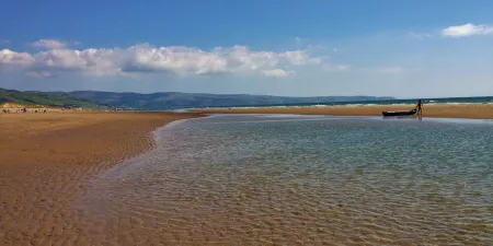 A Sea and Mountain Panorama from this charming stone barn