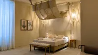 Palazzo Russo Suite & Apartments