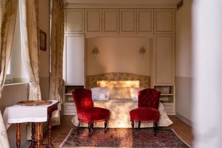 On the ground floor of an old farmhouse, in the countryside with a swimming pool