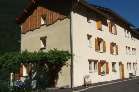 Lovely village house with a view of lake and mountain VAUJANY on the other side Alpe d'Huez