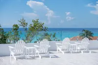 Private 7 Mile Beach Beach Club. Ocean views from Roof Terrace and Pool Pavilion