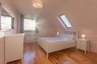 Modern house CORNELLO with garden next to lagoon Hotels in Gmina Wolin