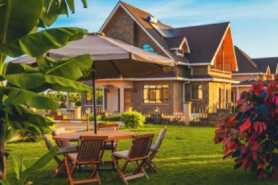 An elegant villa located in a serene Golf Resort, where luxury meets opulence. Hotels in 