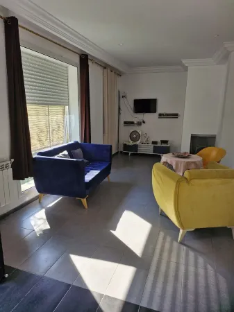 Beautiful new s+2 with garden and motorized garage in a residential...