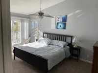 Waterfront modern home Sleeps 6 near Marina w/ Hot Tub, Large Deck, and EVCharge