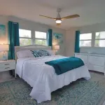 Enjoy a Tranquil Vacation on Expansive Canal with Passing Boats and Heated Pool.