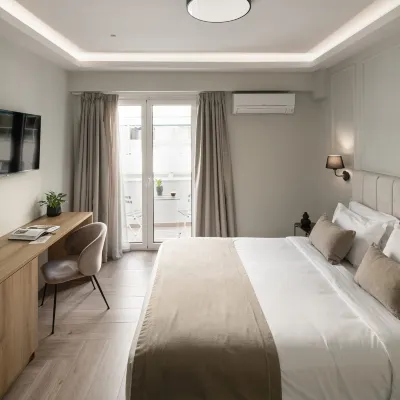 Astikon Xenofontos Suites Hoteles cerca de Galería Thanassis Frissiras