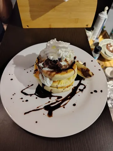 รูปภาพของอาไม แพนเค้กเกอรี่ แอนด์ เรสซิเดนซ์