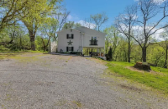 Riverside Serenity: A Picturesque Retreat 2 Bedroom Cottage by RedAwning