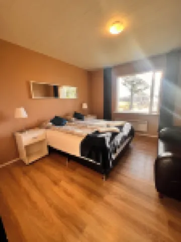 Hlíðarból Guesthouse Hotels in 