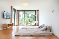 Seogwipo Janjan Pension Hôtels à proximité de : Temple Hyelimsa