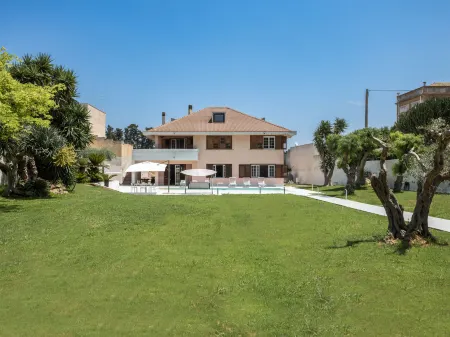 Sammartano Отели рядом с достопримечательностью «Porta Garibaldi»