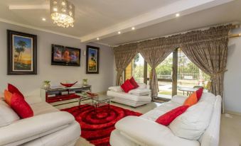 Room in Guest Room - Ezulwini Guest House - Queen Room with Balcony, Pool View & Jacuzzi in Balito