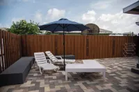 A Relaxing Retreat a Few Steps from the Sun-Soaked Dover Beach and the Vibrant S