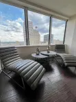 Cozy Retreat with Rooftop Pool, Parking, and Spacious Comfort - Condos