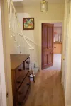 Fabulous house with sun-doors and patio - Large mature garden. Mountain views.
