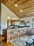 Three-bedroom house with views, decks, golf cart and home gym!